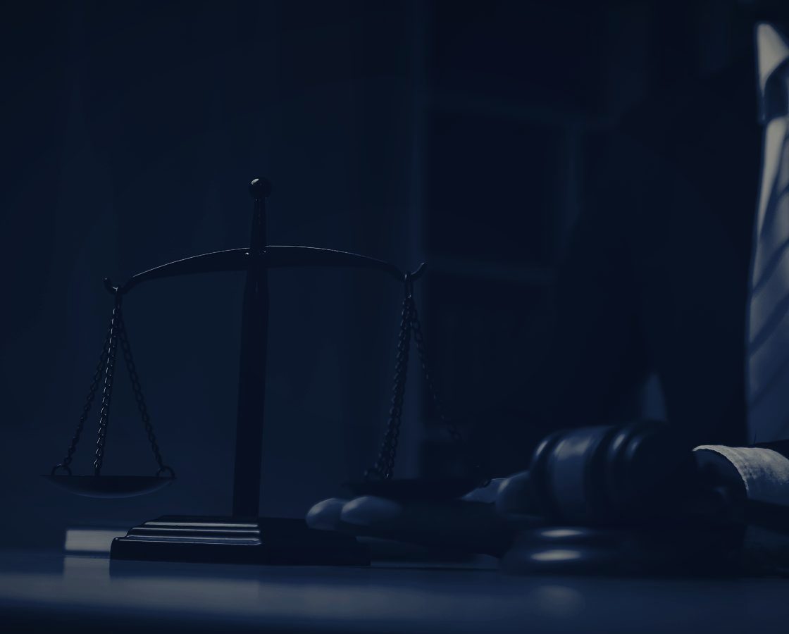Scales of justice and gavel in the courtroom